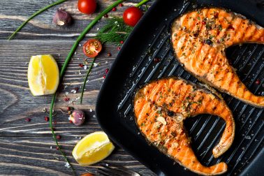 Grilled red fish steaks salmon on the grill pan